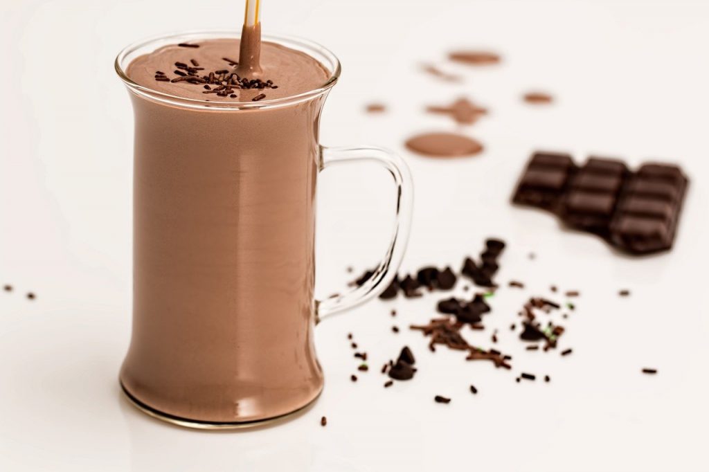 Chocolate milk made of powdered gluten-free milk in a glass